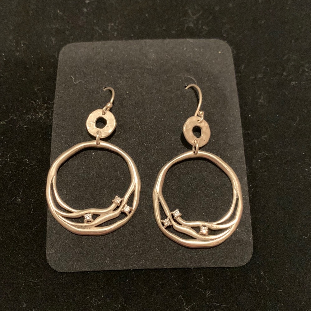 Silpada silver and cz’s earrings on French wire drop.